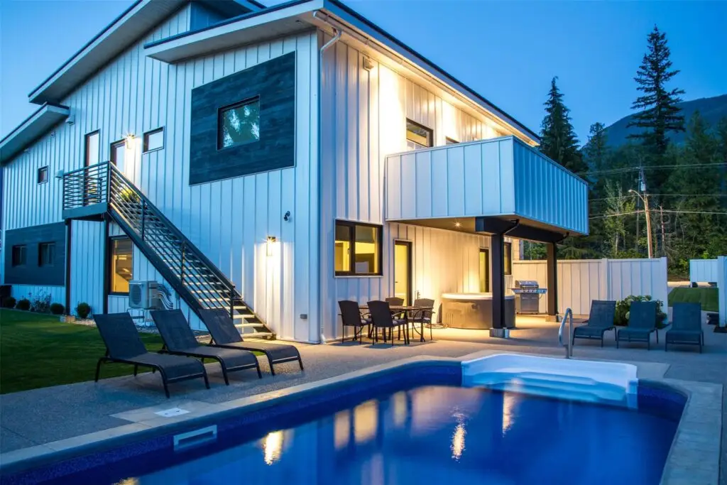 Cloudbreak | Monthly Rental in Revelstoke | Pool Area at Dusk